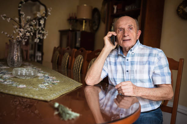 istock Senior man talking on phone 1288139499