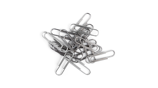 Paper clips on a white background. High quality photo