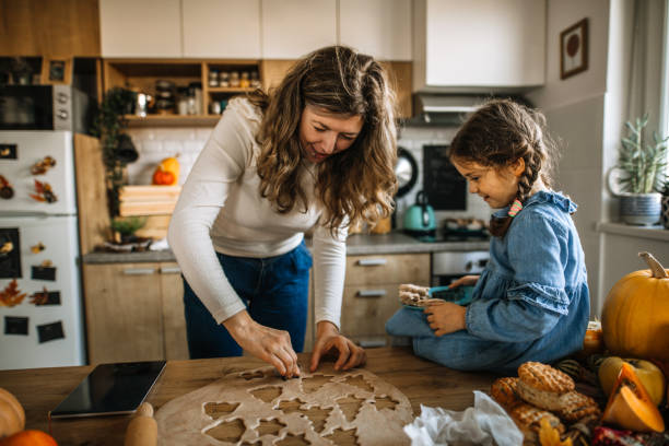 istock Fun in kitchen with dough for cookies 1288140457