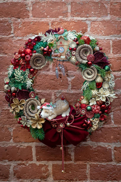 istock Advent wreath with candles, table handmade arrangement mini decoration for new year, artificial Christmas tree interior decoration 1288140794