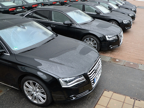 Frankfurt, Germany - 11 September, 2013: The Audi A8 limousines stopped on a public parking. These vehicles are the ones of the most popular premium cars in the world.