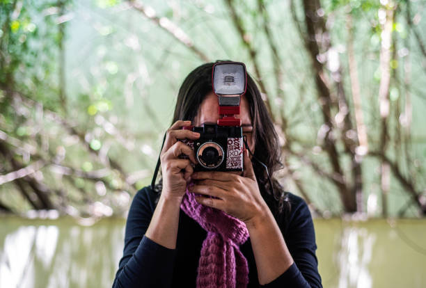 Woman, photographing, with, analog  camera