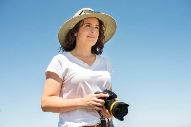 istock Young photographer out taking pictures on a sunny day 1288147002