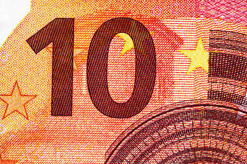 Euro banknotes with a face value of ten euros, a close-up of a cash banknote of 10 euros of the European Union