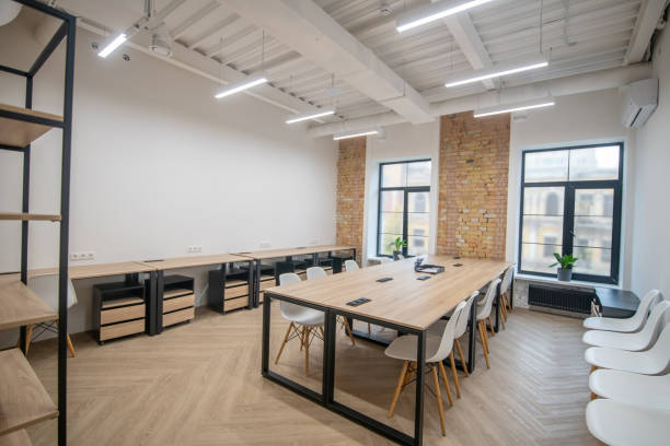 istock Light office with new furniture and striplights 1288148878