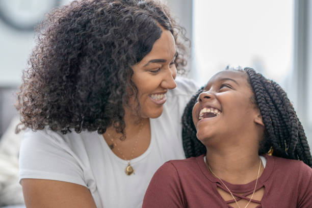 istock Beautiful African American mother and daughter 1288149049