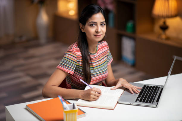 istock Young woman study at home - stock photo 1288149876