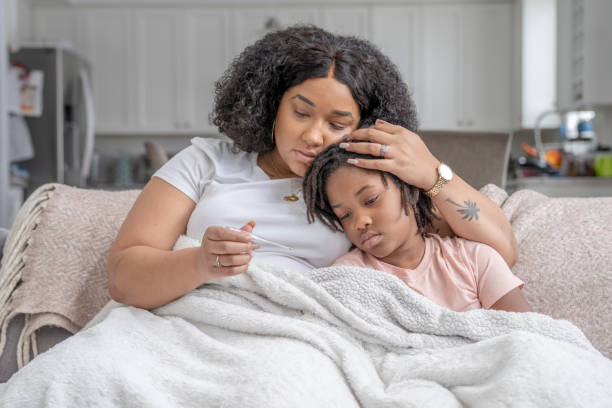 istock Mother and her sick child 1288151113