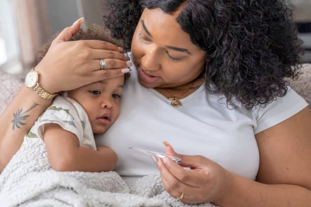 istock Mother and her sick child 1288151131
