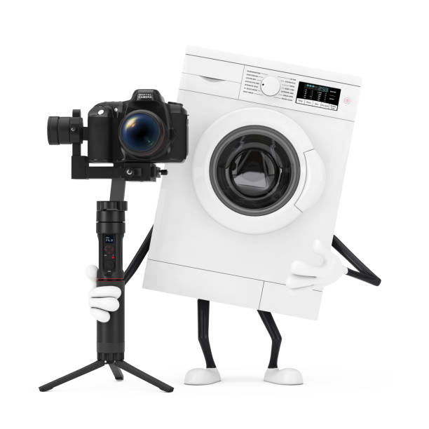 istock Modern White Washing Machine Character Mascot with DSLR or Video Camera Gimbal Stabilization Tripod System. 3d Rendering 1288152341