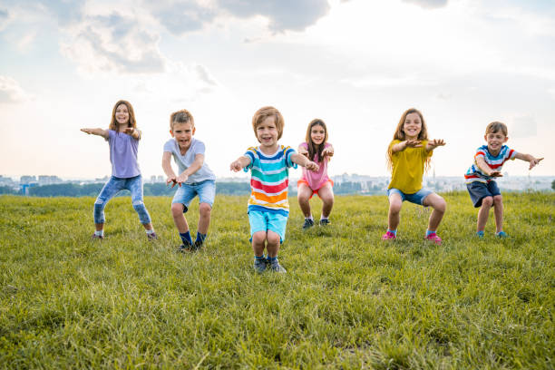 istock Kids having exercise in nature 1288153795