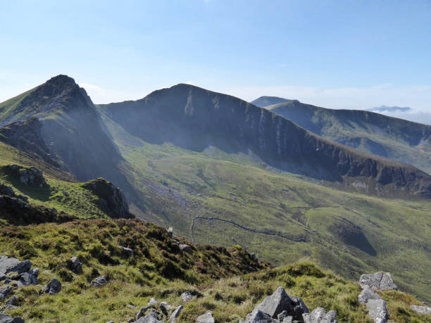istock A dramatic mountain landscape rising above the swirling mist 1288155750