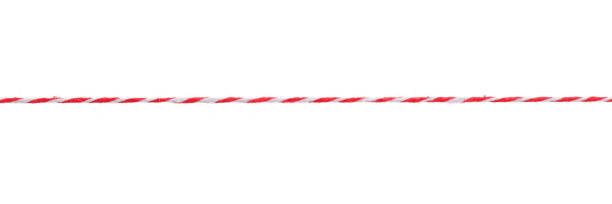 istock Red and white twisted rope isolated 1288156706