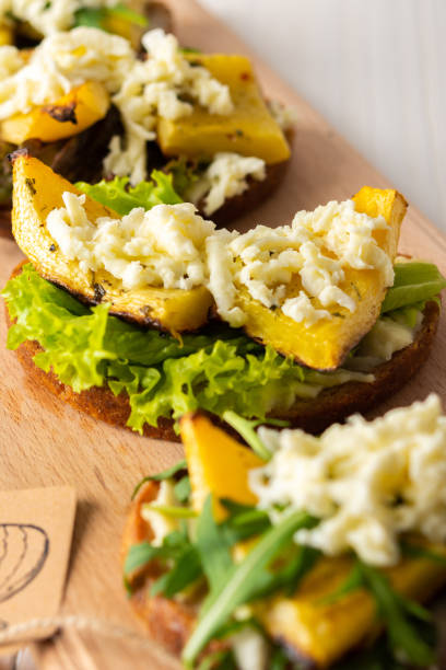 istock Toast with pumpkin, arugula and cheese 1288157009