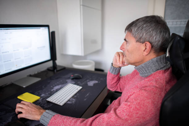istock A day at work. Working from home. Smart working. Portrait of man in smart working  during covid-19 pandemic 1288159293