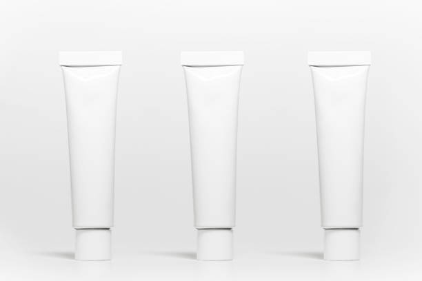 istock Set of white aluminum toothpaste tube isolated on white studio background. 1288160186