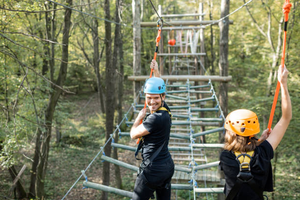 istock Man and woman in a rope park 1288161571