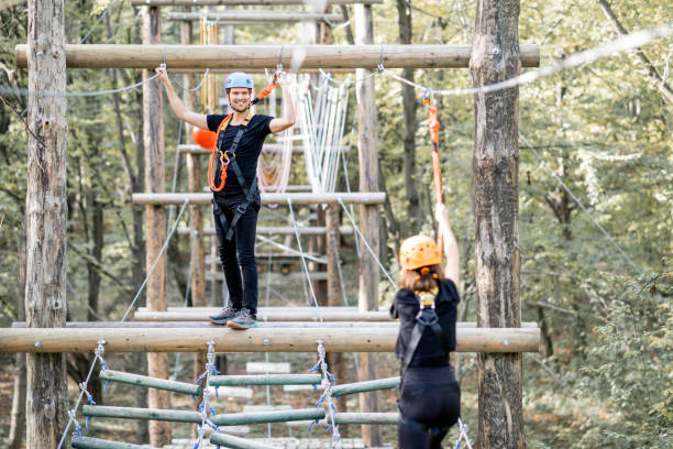 istock Man and woman in a rope park 1288161603
