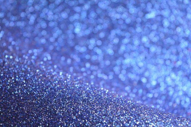 istock Winter Magic Blue Sparkle Glitter Lights Background. Sapphire Color. Shine Bokeh Effect 1288162539