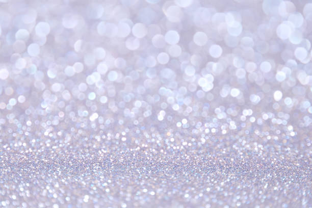 istock Silver lilac glitter background. Selective focus. Beautiful sparkle abstraction. Bokeh Effect. 1288162552