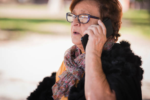 istock Older woman having phone conversation 1288164802