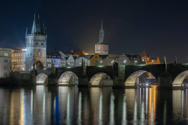 istock time lapse bridge  of the flowing river Vltava 1288165038