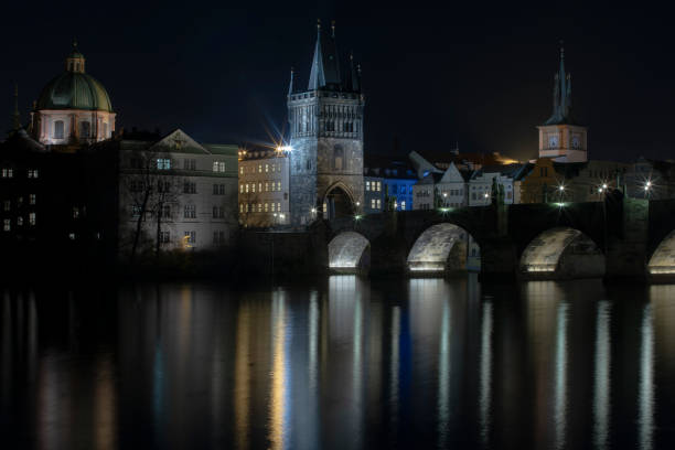 istock time lapse bridge  of the flowing river Vltava 1288165067