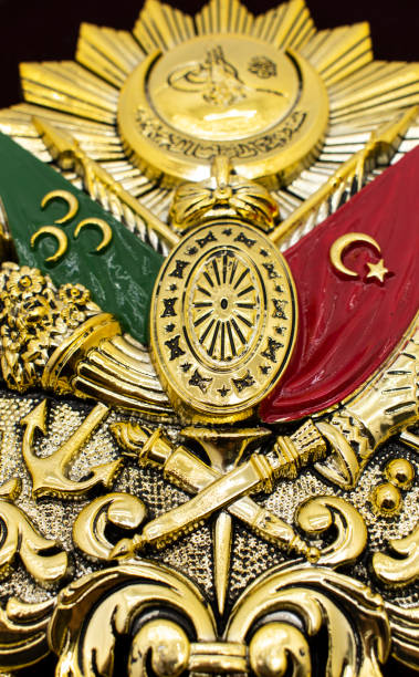 istock Ottoman Empire Emblem. Golden-leaf Ottoman Empire Emblem isolated on white background 1288165970