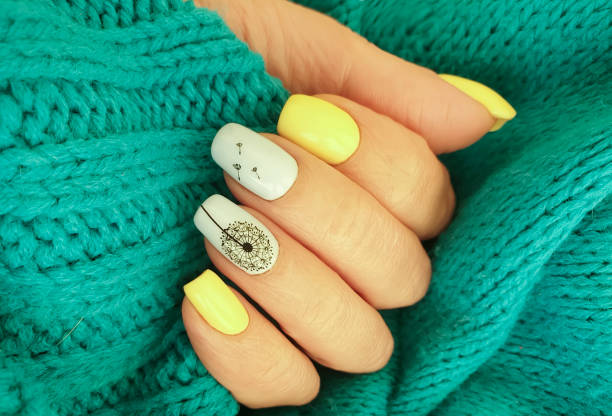istock female hand manicure sweater 1288166287