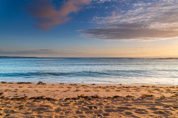 istock Sandy bay sunrise seascape 1288169654