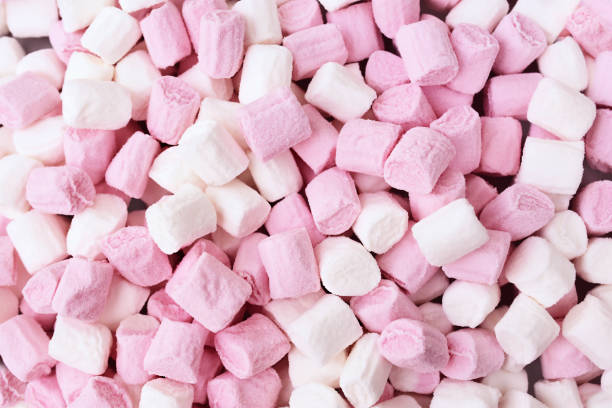 istock Marshmallow sweets pastel background, colorful confectionary card 1288171180