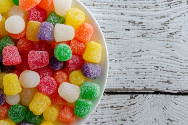 colorful gum drops in bowl - gum drop copy space sweet food gelatin dessert imagens e fotografias de stock