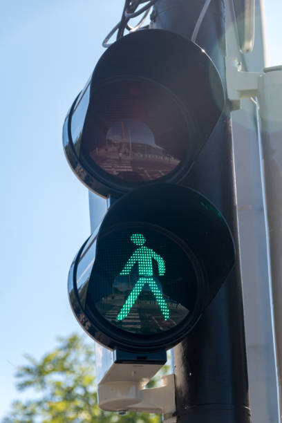 istock Green pedestrian traffic light at Prague, Czech Republic. 1288174785
