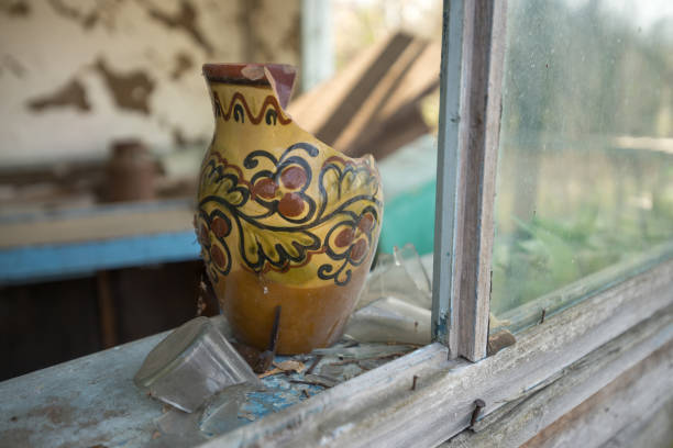 Old broken tableware in house of abandoned village Starosillya, Chernobyl exclusion zone, Ukraine