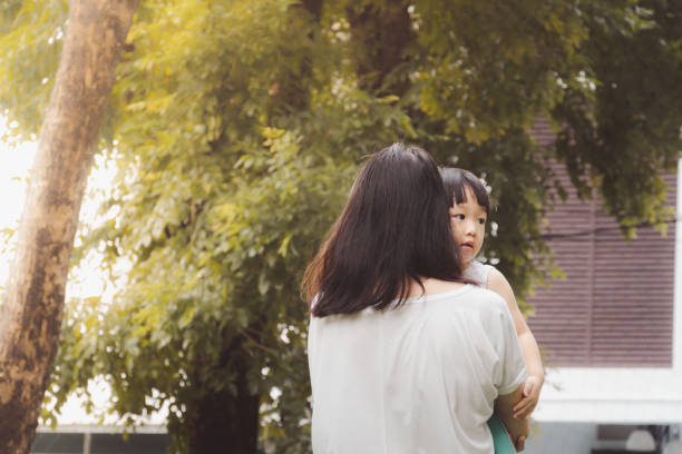 istock Asian 3 year old kid and mom in park. 1288179180