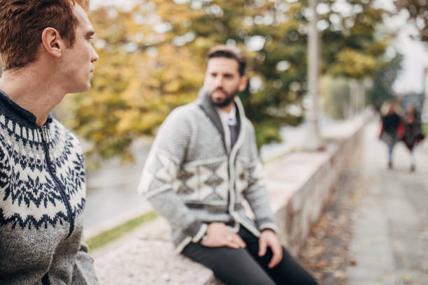 istock Modern men outdoors in city 1288182564