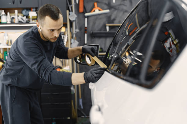 istock Preparing a car before spray painting 1288190250