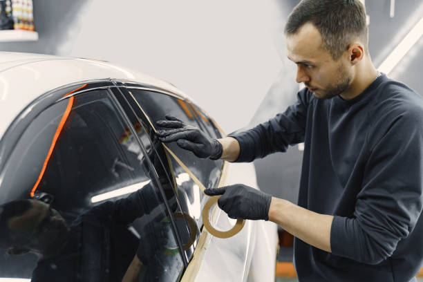 istock Preparing a car before spray painting 1288190254