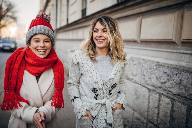 istock Two beautiful women on the street 1288194566