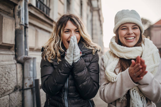 istock Two beautiful women on the street 1288194568