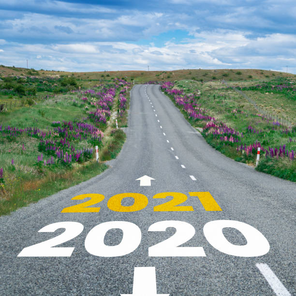 istock 2021 New Year road trip travel and future vision concept . 1288198106