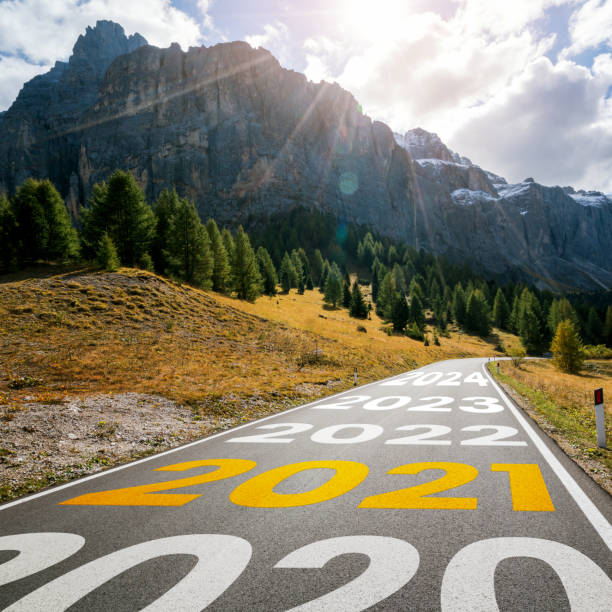 istock 2021 New Year road trip travel and future vision concept . 1288199533