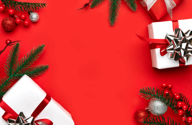istock Christmas decorations on the red background. Flat lay, top view with copy space for your text. 1288209124