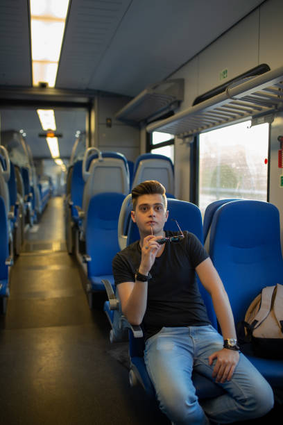 istock Young Man Traveling In Train 1288211185
