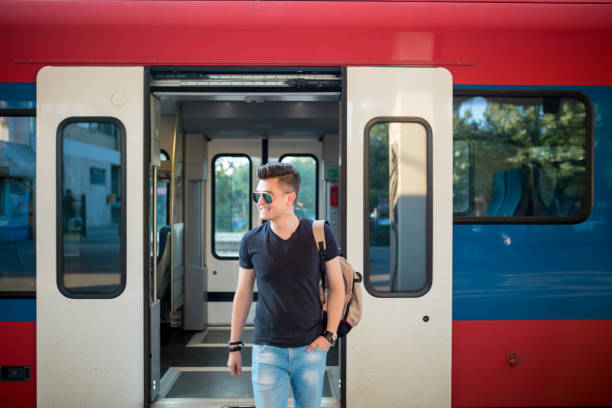 istock Young Man Traveling In Train 1288211238