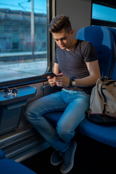 istock Young Man Traveling In Train 1288211257
