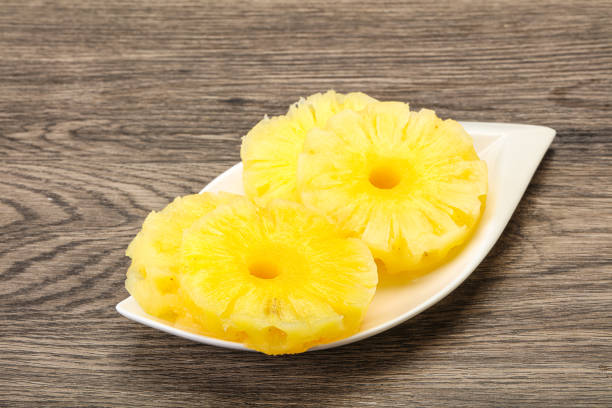 Sweet ripe pineapple rings in the bowl