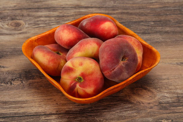 istock Sweet ripe tasty flat peach 1288214691