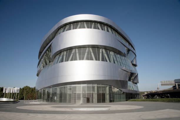 Stuttgart, Germany - October 14, 2019: Modern Architecture Mercedes-Benz Museum under deep blue sky. The Mercedes Benz Museum  is an automobile museum which contains more than 160 vehicles. The Museum opened for the public in 2006 and is since then one of the most futuristic buildings in Stuttgart. Thousands of people from all over the world visit it every year.