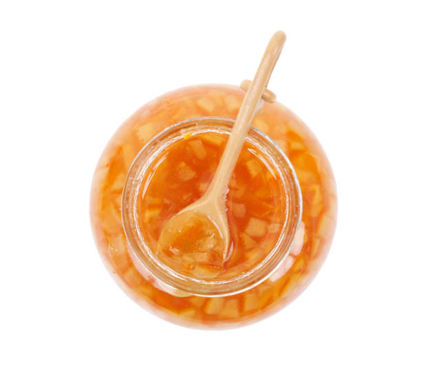 istock Orange homemade jam isolated on white background. Top view. 1288217906